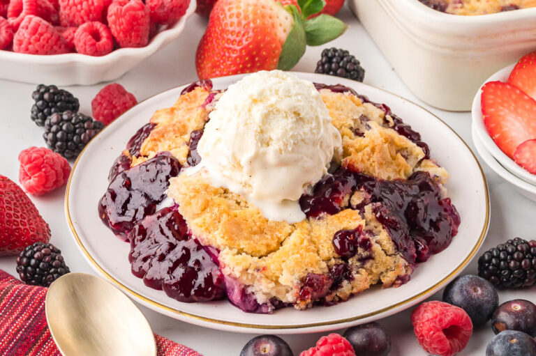 The recipe on a plate topped with a scoop of vanilla ice cream.