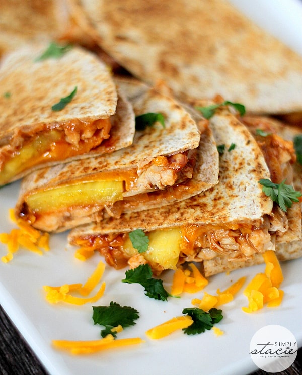 BBQ Chicken & Pineapple Quesadillas - A modern twist on the classic Mexican handheld meal! Smothered in smoky sauce, tender chicken and juicy pineapple, it's the perfect sweet and savory recipe.