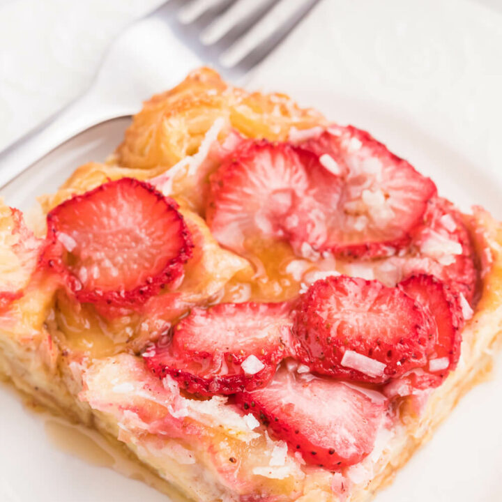 Strawberry & Coconut Breakfast Casserole - This is such a quick and easy overnight breakfast casserole to throw together. The strawberries add a beautiful colour, and the coconut is a delicious surprise flavour!