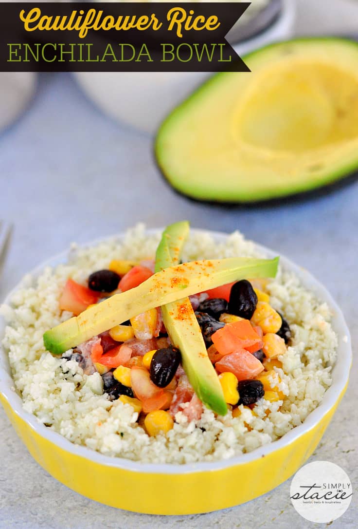 Cauliflower Rice Enchilada Bowl - The low-carb option for Taco Tuesday! This light vegetarian dish is made with cauliflower rice, corn, black beans, sour cream, and a little avocado on top.