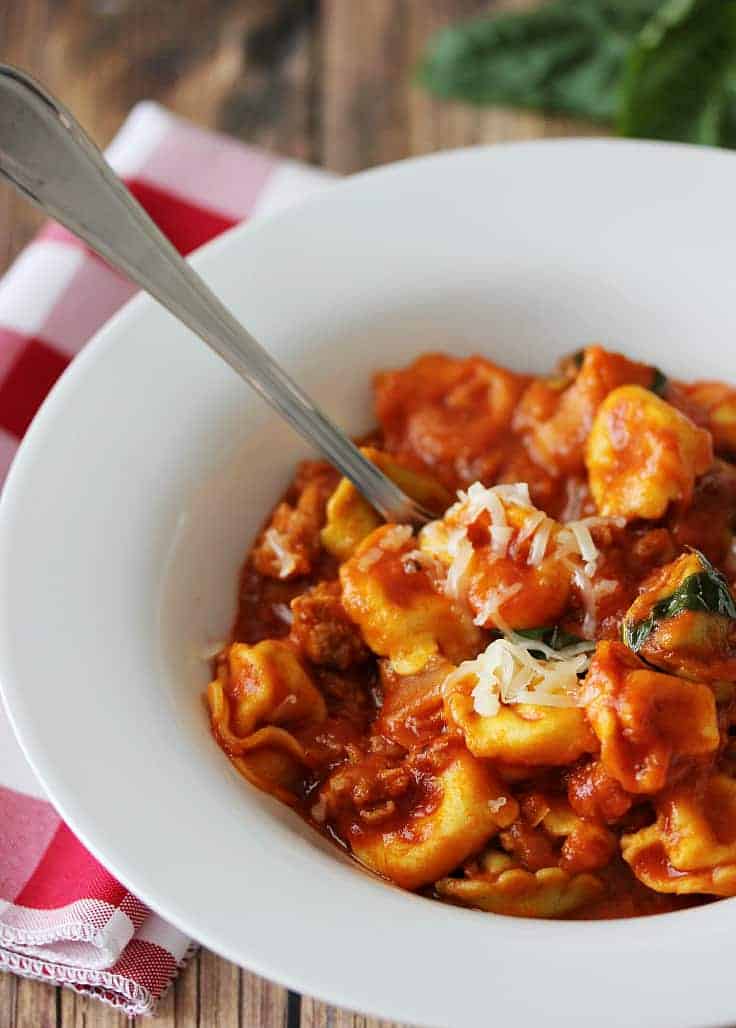 One-Pot Sausage & Cheese Cappelletti - Dinner in a flash! Skip the dishes with this savory pasta dish packed with Italian sausage, mozzarella cheese, basil, garlic, and oregano.