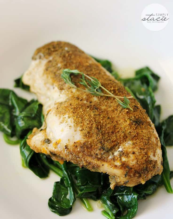 Chicken Posole with Wilted Spinach - flavored with a fragrant blend of Mexican spices and a hint of orange and served on a bed of garlic baby spinach. Yum!