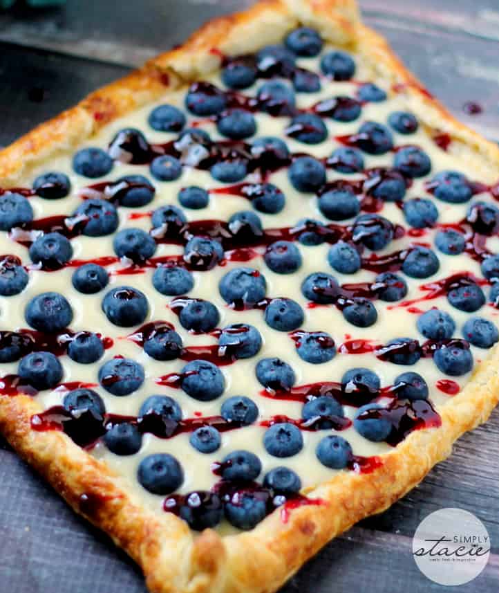 Rustic Blueberry Lemon Tart - With a flaky crust, creamy lemon filling and topped with fresh blueberries and preserves, just thinking about this luscious dessert makes me drool!