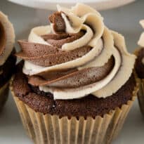 A cupcake on a stand.