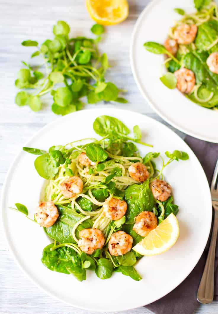 Garlic Shrimp with Chilli Pesto Pasta - Skip the jarred spaghetti sauce! Homemade pesto is the best complement for these sweet and spicy shrimp on a bed of noodles and baby spinach.