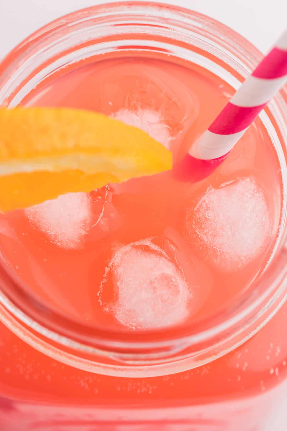 Overhead view of the recipe in a glass with a straw.