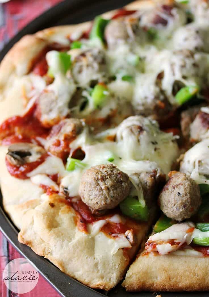 Italian Meatball Pizza - Take your homemade pizza to the next level with Italian meatballs, green peppers, mushrooms, and plenty of cheese.