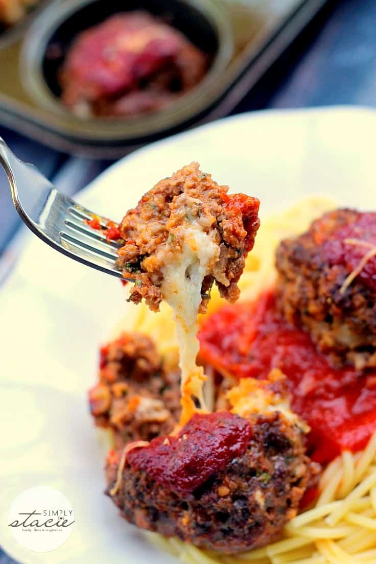 Easy Cheesy Meatballs - These stuffed meatballs are perfect with pasta or as a solo dish! Whip them up for a spaghetti dinner or simple party appetizer.