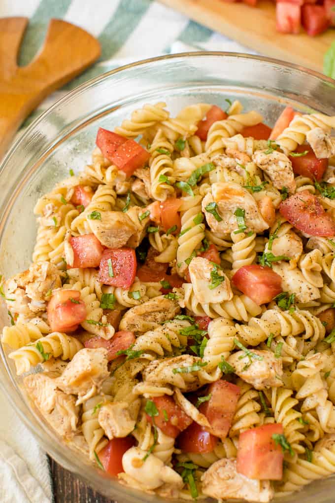 Bruschetta Chicken Pasta Salad - The best pasta salad! Add fresh tomatoes and basil for an amazing summer side dish packed with protein.