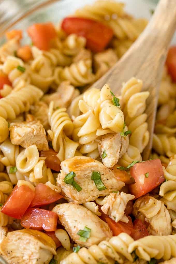 Bruschetta Chicken Pasta Salad - The best pasta salad! Add fresh tomatoes and basil for an amazing summer side dish packed with protein.