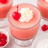 Cherry mousse in a parfait dish.