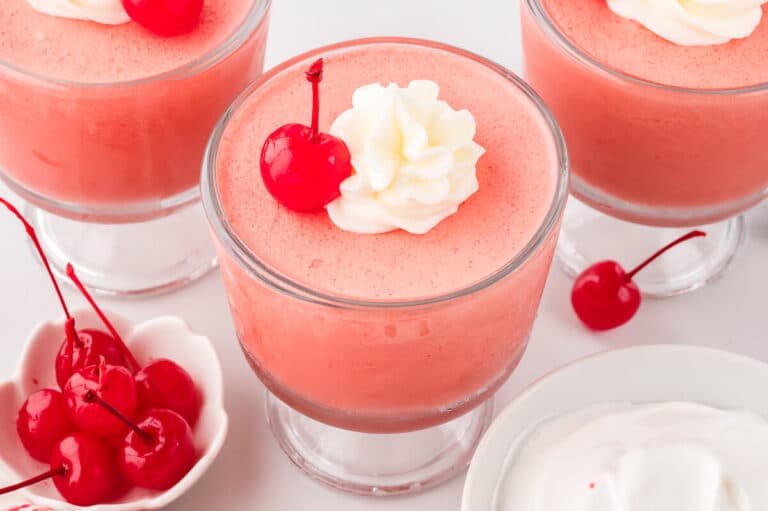 Cherry mousse in a parfait dish.