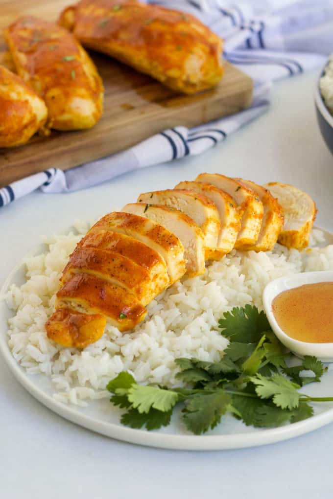 Honey Dijon Chicken - ​No dry chicken here! Take your juicy baked chicken breasts from basic to amazing with this sweet and savory marinade. Chicken breasts smothered in honey, Dijon mustard and spices and then baked to perfection!​