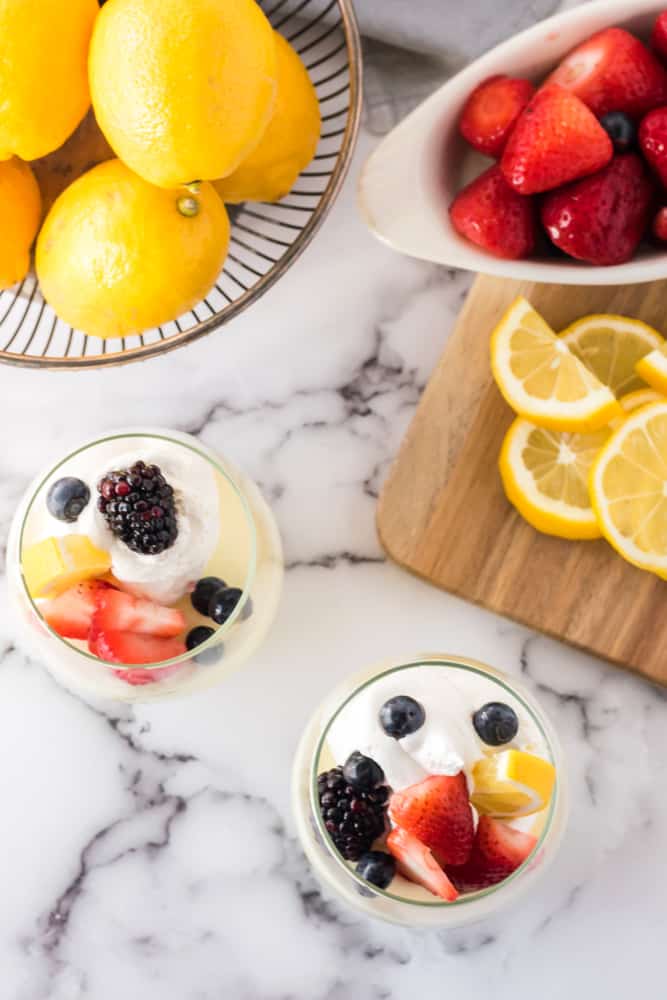 Lemon Cheesecake Mousse - The perfect fluffy lemon dessert! This mousse is lighter than cheesecake, but still tastes like a fresh slice from your favorite NYC eatery.