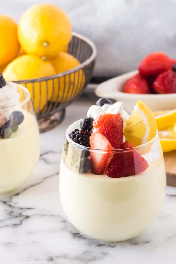 Lemon Cheesecake Mousse - The perfect fluffy lemon dessert! This mousse is lighter than cheesecake, but still tastes like a fresh slice from your favorite NYC eatery.