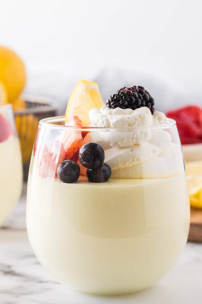 Lemon Cheesecake Mousse - The perfect fluffy lemon dessert! This mousse is lighter than cheesecake, but still tastes like a fresh slice from your favorite NYC eatery.