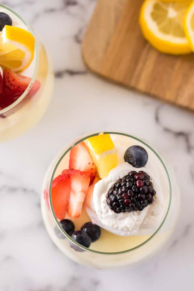 Lemon Cheesecake Mousse - The perfect fluffy lemon dessert! This mousse is lighter than cheesecake, but still tastes like a fresh slice from your favorite NYC eatery.