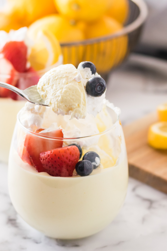 Lemon Cheesecake Mousse - The perfect fluffy lemon dessert! This mousse is lighter than cheesecake, but still tastes like a fresh slice from your favorite NYC eatery.