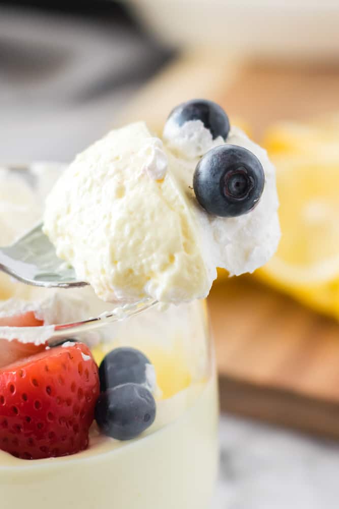 Lemon Cheesecake Mousse - The perfect fluffy lemon dessert! This mousse is lighter than cheesecake, but still tastes like a fresh slice from your favorite NYC eatery.