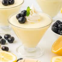 Lemon cheesecake mousse in a parfait dish.
