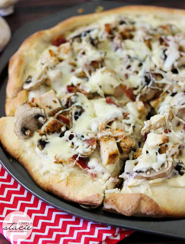 Chicken Bacon Alfredo Pizza - Turn your favorite pasta into a pizza! Ditch the red sauce for creamy Alfredo sauce, moist chicken, and crunchy bacon!