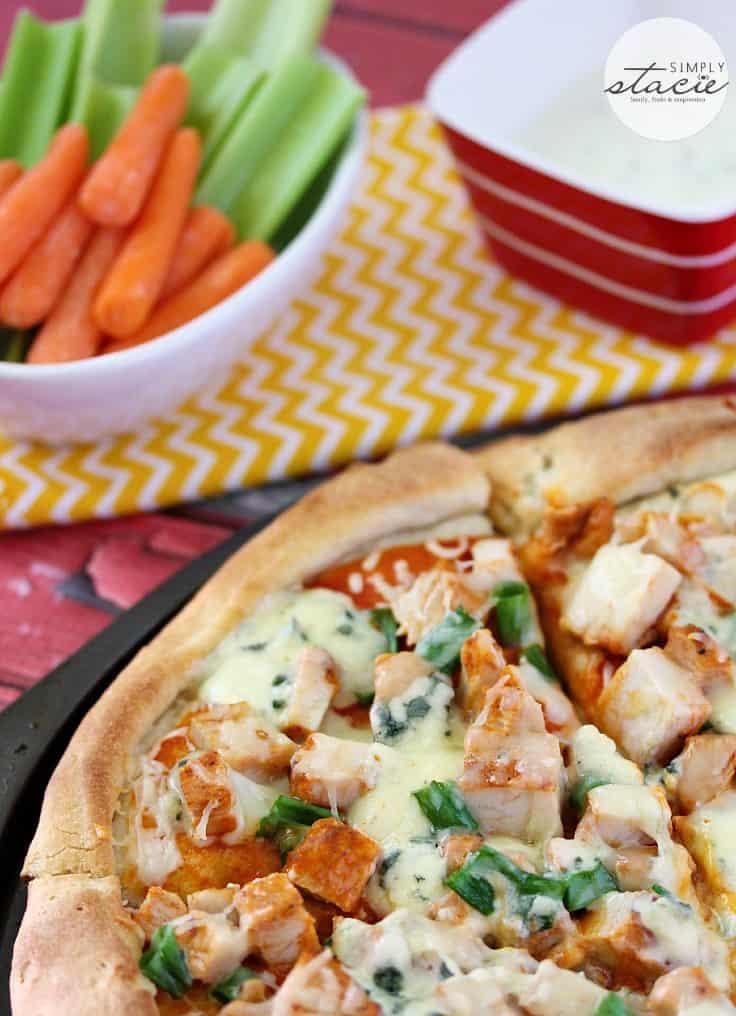 Buffalo Chicken Pizza - A little spice and a ton of flavor! This homemade pizza is ready in just half an hour. Made with tender chicken, spicy Buffalo sauce and blue cheese.