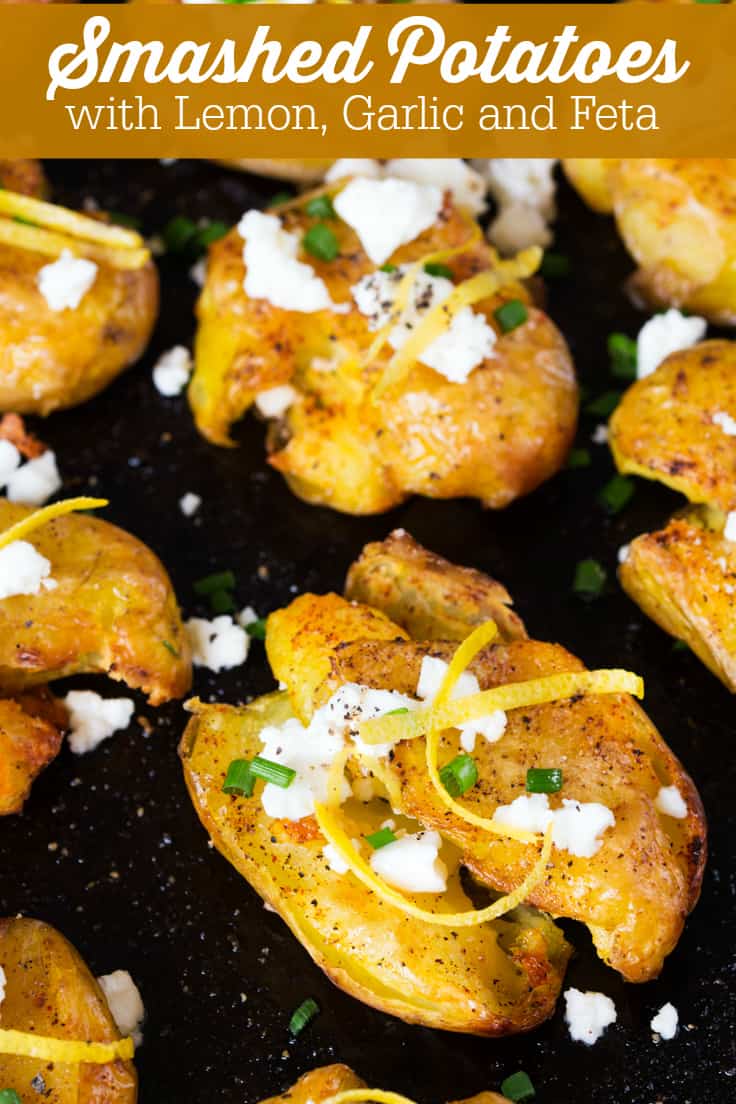 Smashed Potatoes with Lemon, Garlic, and Feta - This easy potato side dish is crunchy on the outside and fluffy on the inside! Topped with lemon zest, crumbled feta cheese, and smoked paprika.