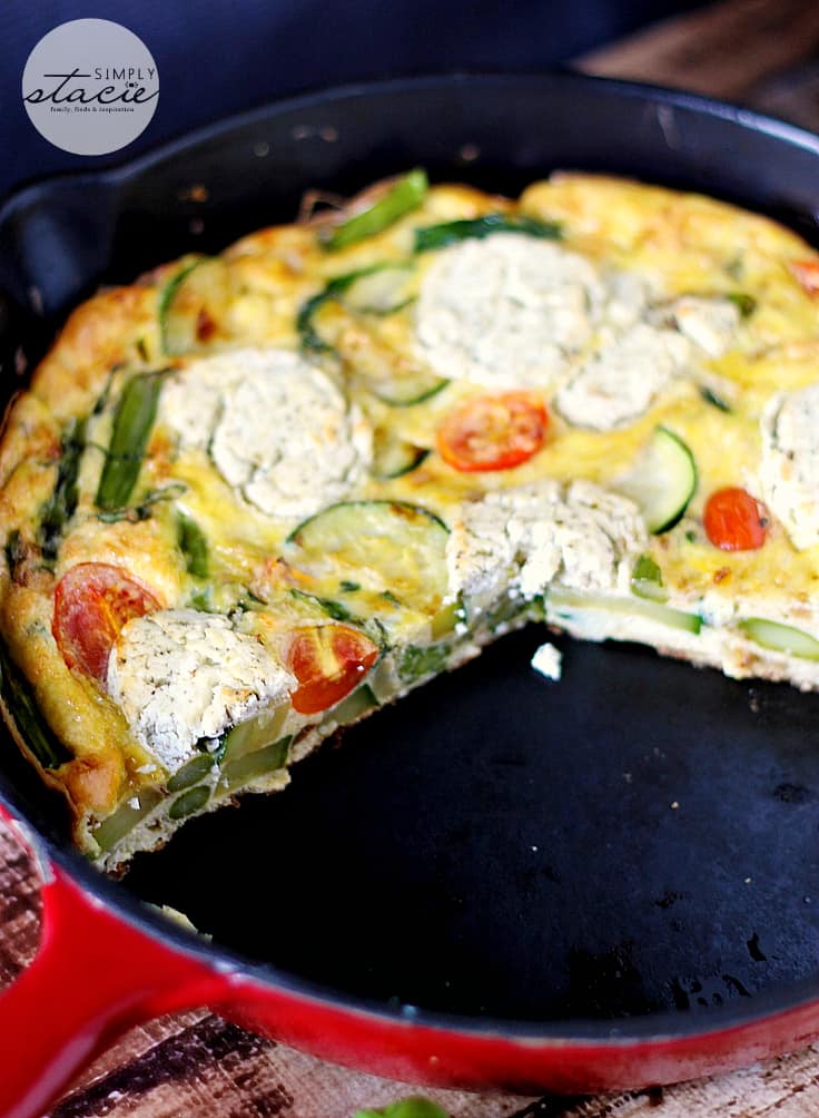 Spring Vegetable & Goat Cheese Frittata - Loaded with the fresh flavours of spring, featuring asparagus, zucchini, tomatoes and the creamy tang of goat cheese, this frittata is very versatile. It can be served warm or at room temperature and is a great breakfast, lunch, or paired with salad, and quick, light dinner option.