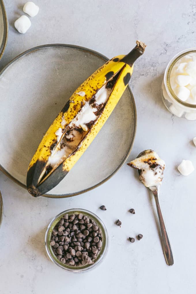 Banana Boats - The perfect camping dessert! Ripe bananas stuffed with gooey marshmallows and melty chocolate are always in season.