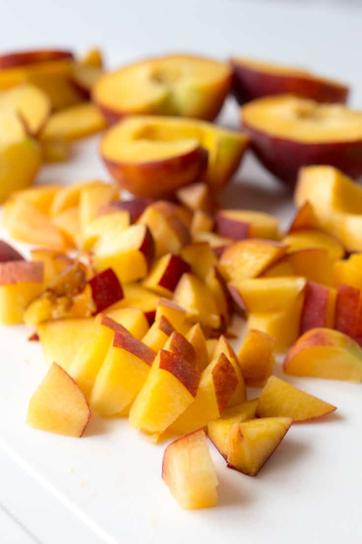 Peach Bread - An incredibly moist and tender dessert bread loaded with five peaches and topped with a sticky brown sugar glaze!