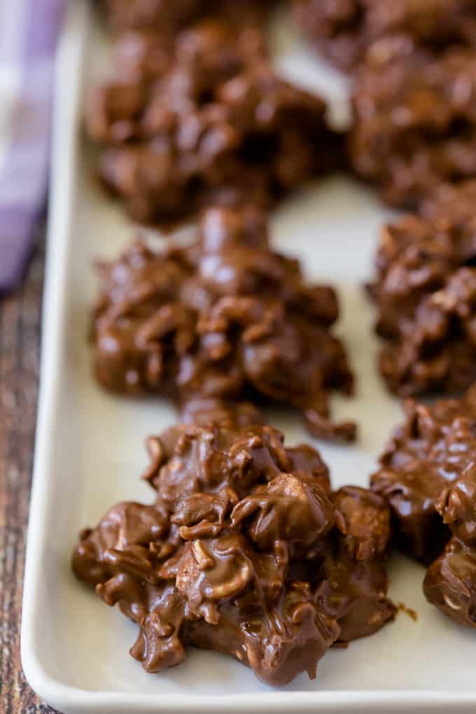 Rocky Road Bites - No-bake dessert alert! These sweet kitchen sink treats are covered in peanut butter PLUS chocolate and filled with gooey marshmallows and a crunchy surprise.