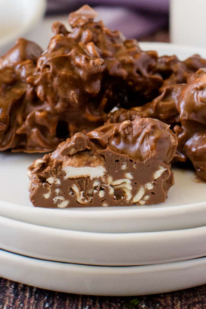 Rocky Road Bites - No-bake dessert alert! These sweet kitchen sink treats are covered in peanut butter PLUS chocolate and filled with gooey marshmallows and a crunchy surprise.