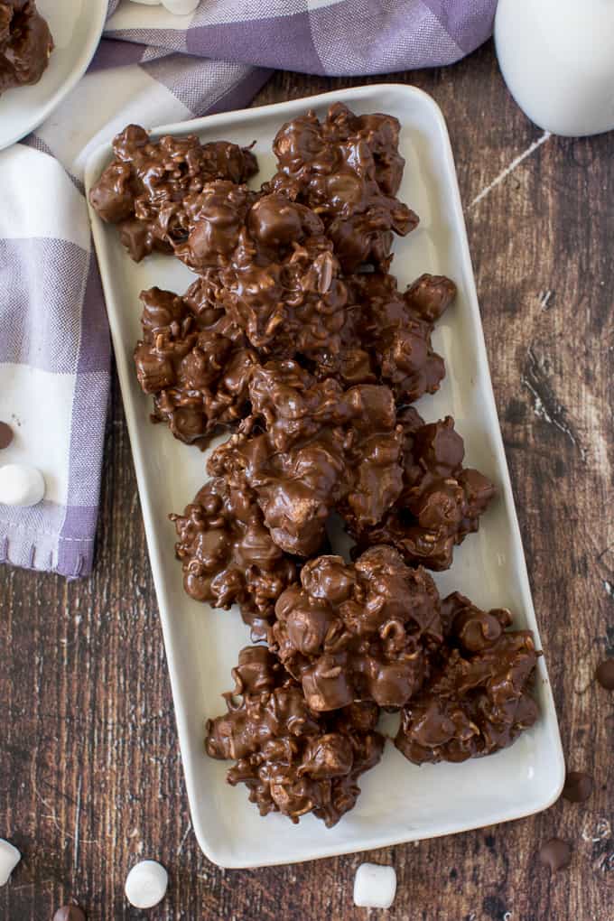 Rocky Road Bites - No-bake dessert alert! These sweet kitchen sink treats are covered in peanut butter PLUS chocolate and filled with gooey marshmallows and a crunchy surprise.