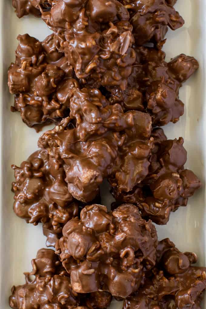 Rocky Road Bites - No-bake dessert alert! These sweet kitchen sink treats are covered in peanut butter PLUS chocolate and filled with gooey marshmallows and a crunchy surprise.