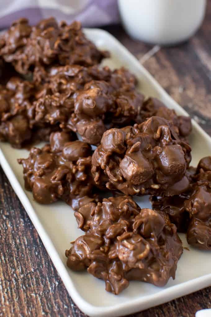 Rocky Road Bites - No-bake dessert alert! These sweet kitchen sink treats are covered in peanut butter PLUS chocolate and filled with gooey marshmallows and a crunchy surprise.