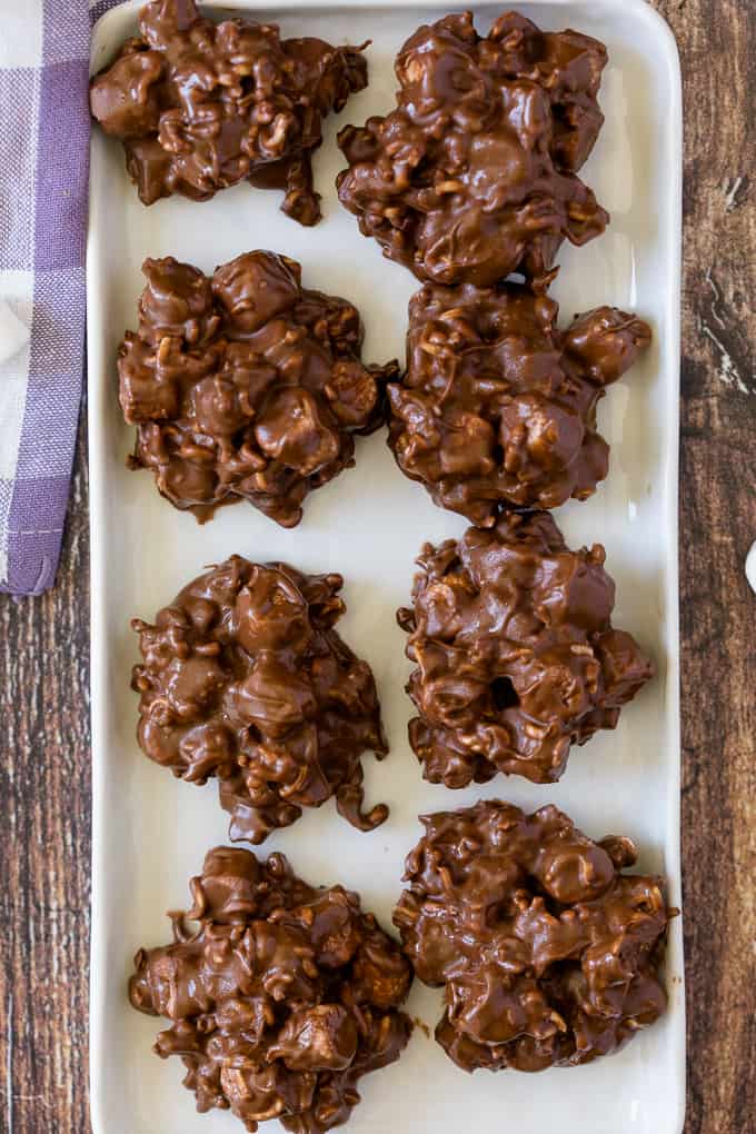 Rocky Road Bites - No-bake dessert alert! These sweet kitchen sink treats are covered in peanut butter PLUS chocolate and filled with gooey marshmallows and a crunchy surprise.