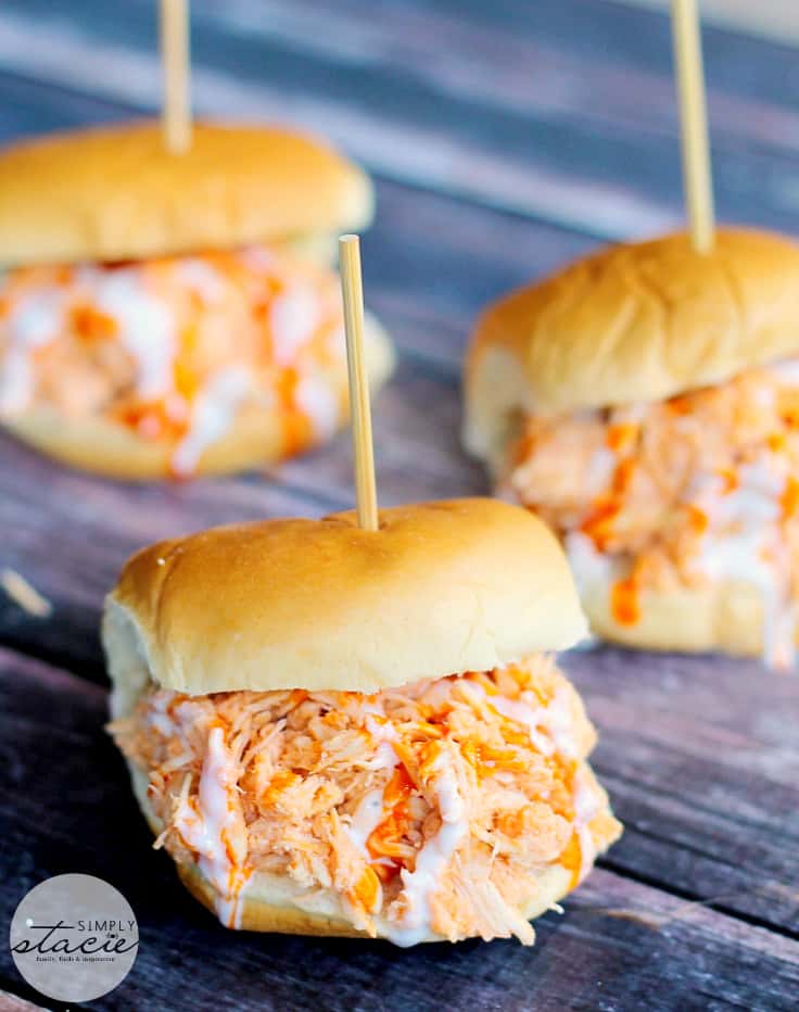 Slow Cooker Buffalo Chicken Sliders - Tender chicken seasoned with Frank's wing sauce and topped with Ranch dressing. These sliders are always a hit!