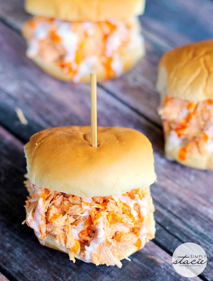 Slow Cooker Buffalo Chicken Sliders - Tender chicken seasoned with Frank's wing sauce and topped with Ranch dressing. These sliders are always a hit!