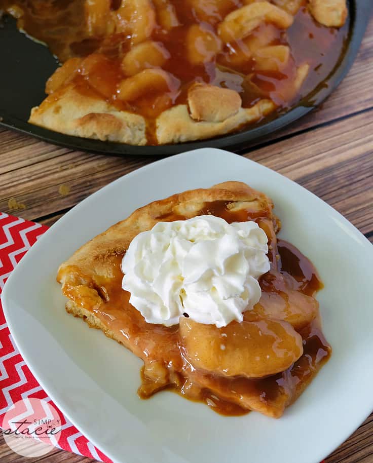 Caramel Apple Pizza - The PERFECT fall dessert pizza! Sweet cinnamon apple pie filling with rich caramel covering a basic pizza crust for the taste of pie without the mess and wait.