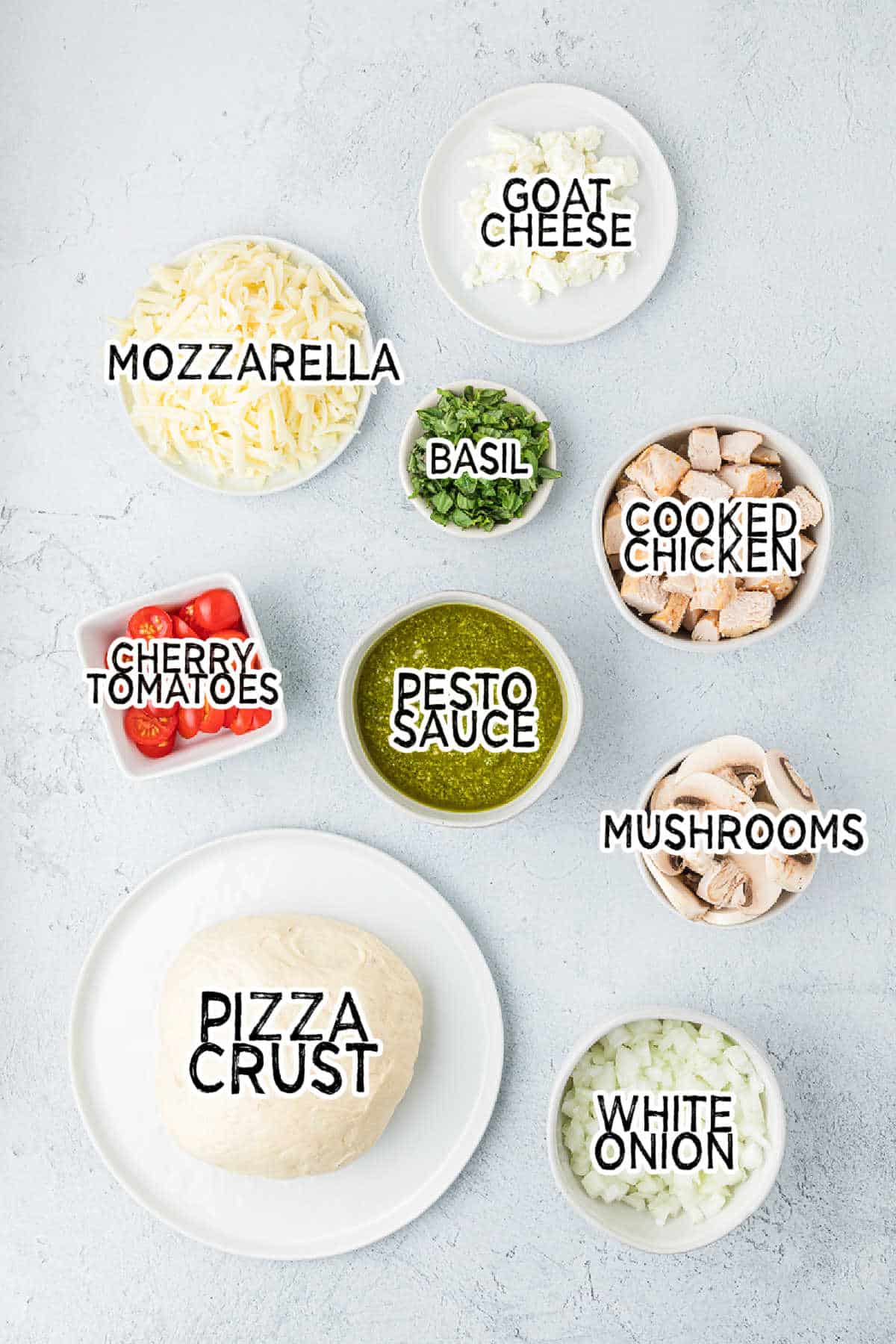 Ingredients to make chicken pesto pizza.