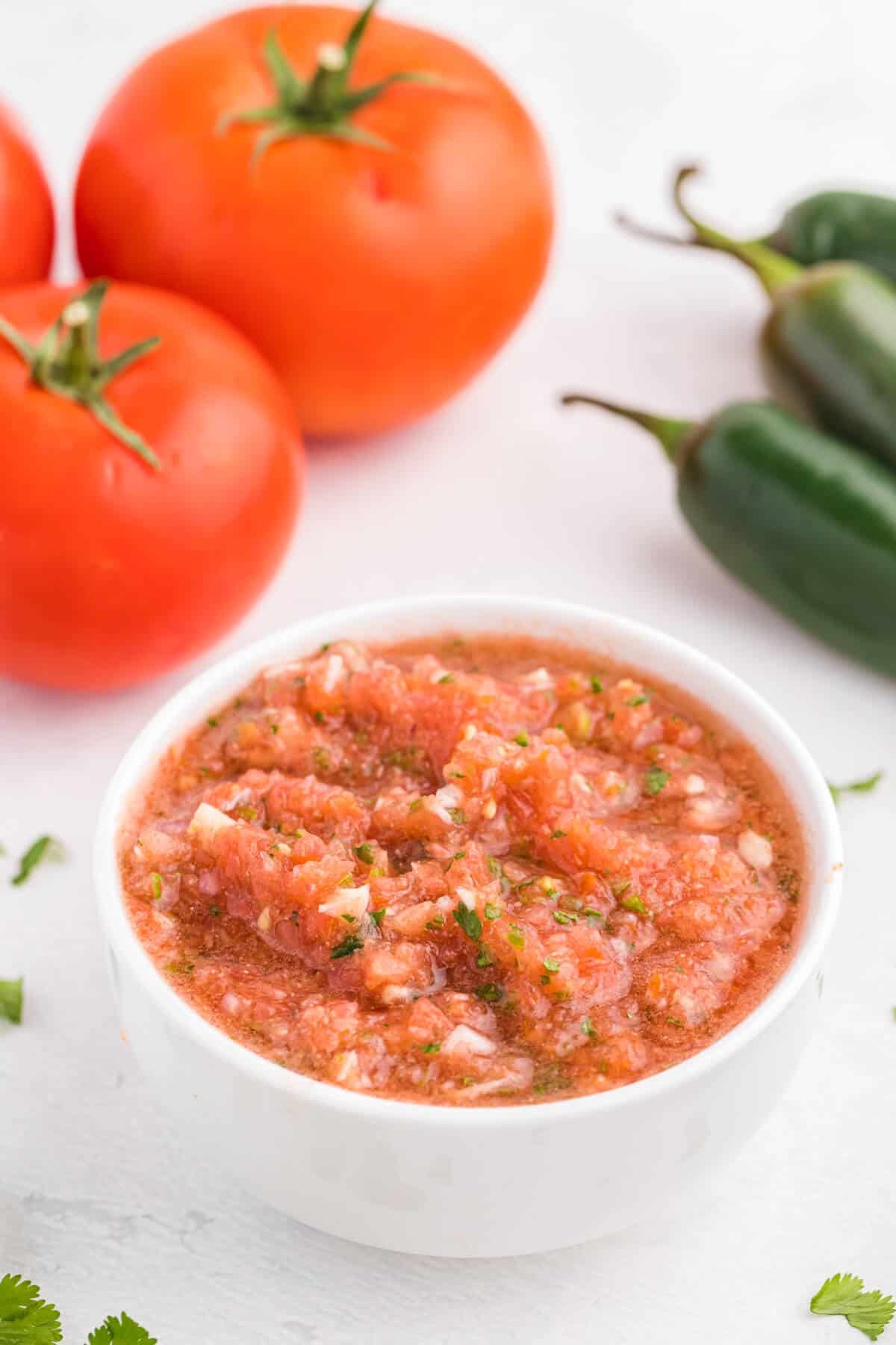 Garden salsa in a white bowl.