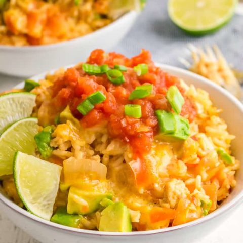 One-Pot Chicken Fajita Rice - Get kids cooking with this easy dinner recipe! It's filled with veggies, avocado, cheese, ground chicken and rice.