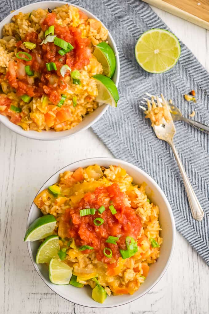 One-Pot Chicken Fajita Rice - Super satisfying one-pan dinner! This quick and easy rice casserole dish is packed with veggies, ground chicken and filled with cheese.