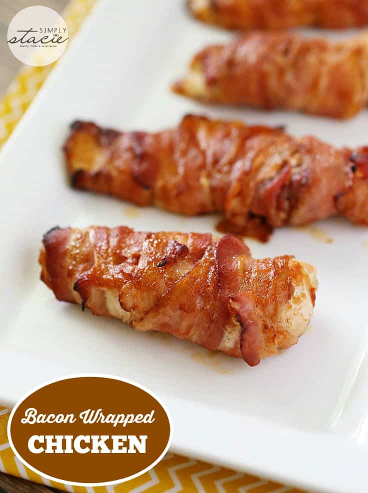 Bacon Wrapped Chicken - Only 4 ingredients! Juicy chicken breasts wrapped in crispy bacon and slathered with barbecue sauce and a little paprika.