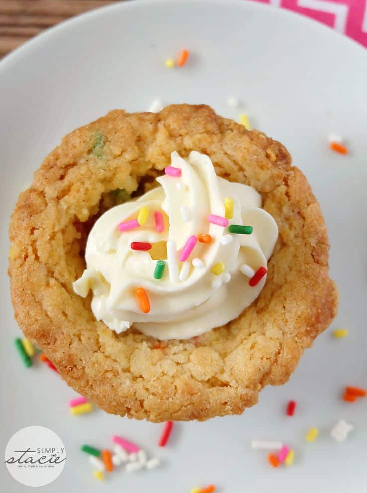 Birthday Cookie Cups - Your new birthday party staple! These bite-size cookie cups are filled with cream cheese frosting and bursting with sprinkles.