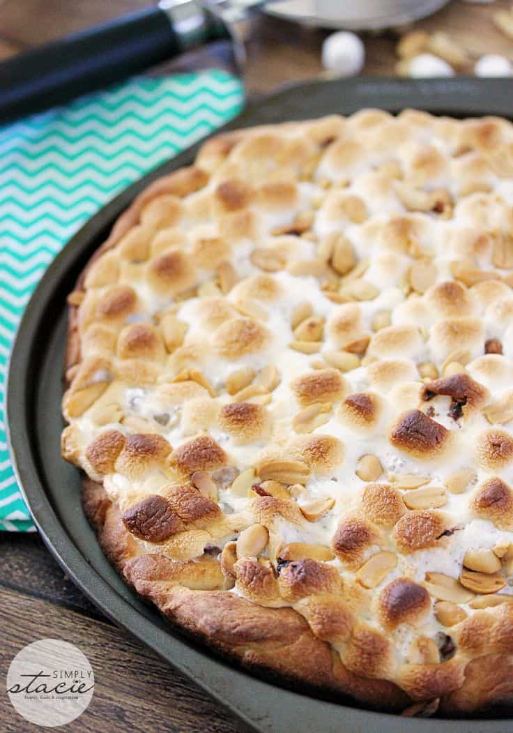 Rocky Road Pizza - Decadent dessert pizza! This pizza is loaded with creamy Nutella, toasted marshmallows, and crunchy peanuts.