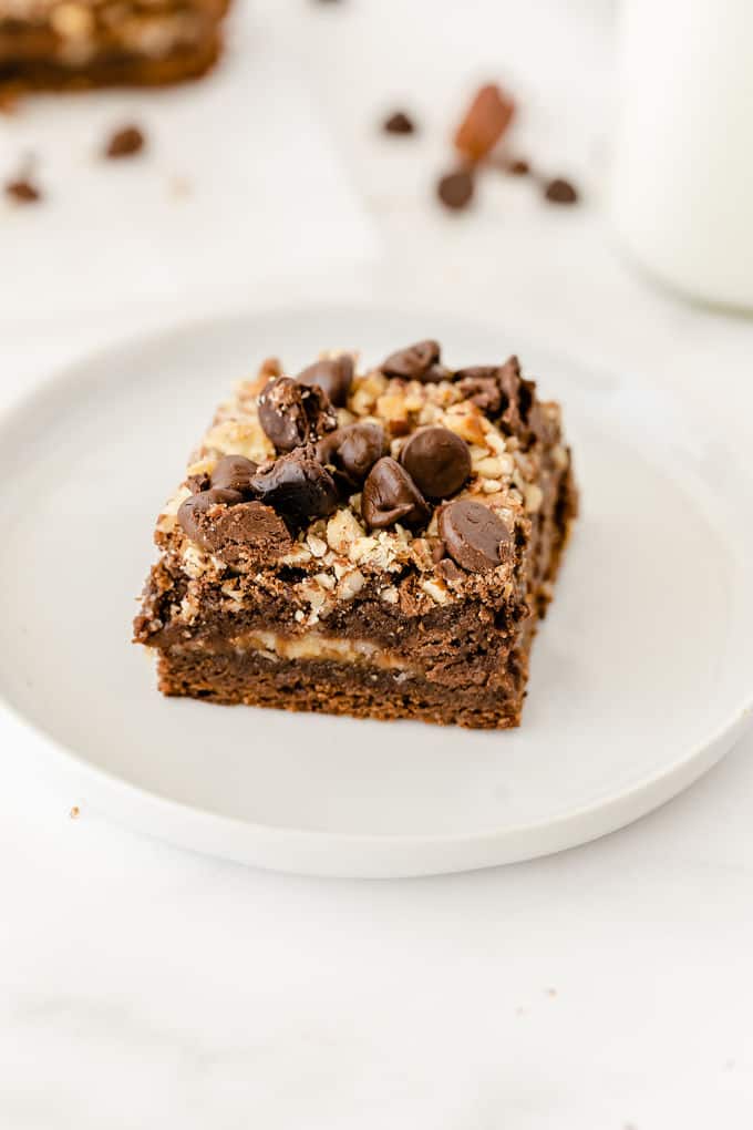 Caramel Bacon Brownies - Salty and sweet are the BEST combination! These decadent brownies are only improved by the salty bacon bits.