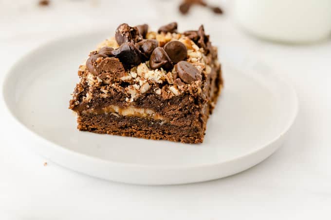 Caramel Bacon Brownies - Salty and sweet are the BEST combination! These decadent brownies are only improved by the salty bacon bits.