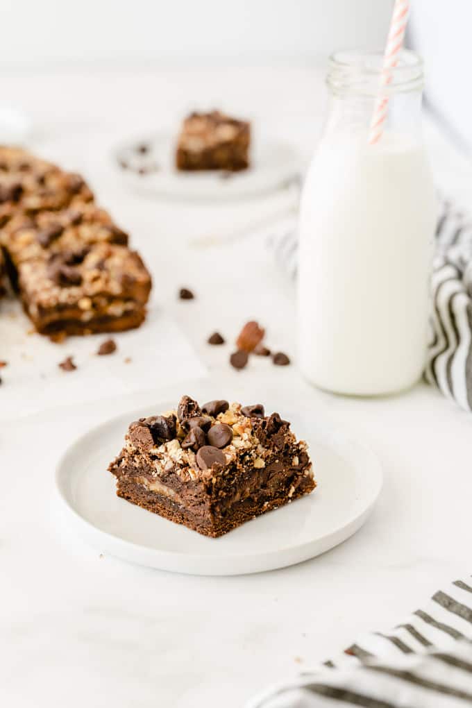 Caramel Bacon Brownies - Salty and sweet are the BEST combination! These decadent brownies are only improved by the salty bacon bits.