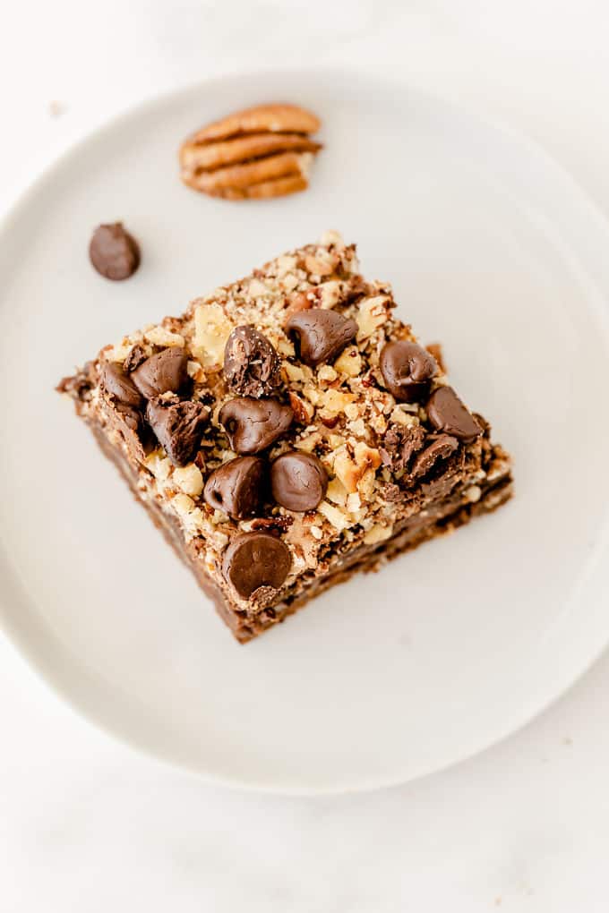 Caramel Bacon Brownies - Salty and sweet are the BEST combination! These decadent brownies are only improved by the salty bacon bits.